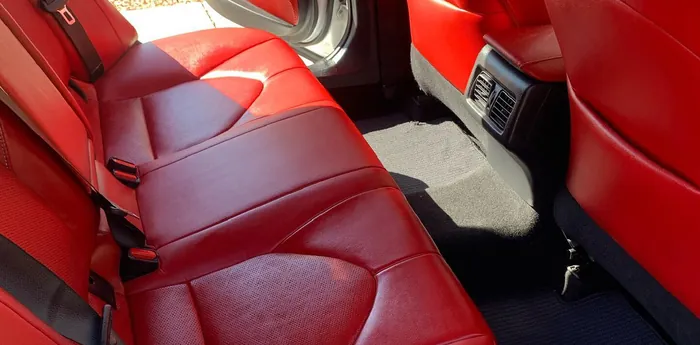 A red leather car interior after a detail